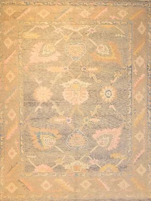 A close up of a rug with a floral pattern on it.