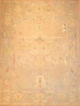 A rug with a floral pattern on it is sitting on a table.