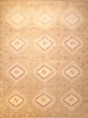 A rug with a pattern on it is sitting on a table.