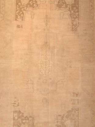 A close up of a rug with a pattern on it.