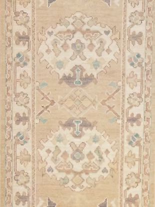 A close up of a rug with a floral pattern on it.