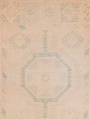 A close up of a rug with a geometric pattern on it.