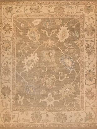 A close up of a rug with a floral pattern on it.