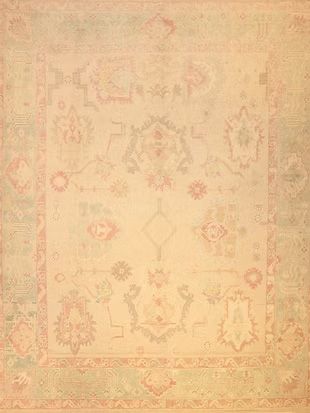 A close up of a rug with a floral pattern on it.