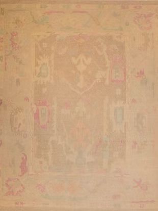 A close up of a rug with a floral pattern on it.