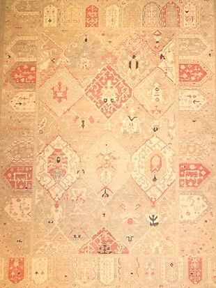 A close up of a rug with a pattern on it.