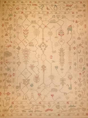 A rug with a pattern on it is sitting on a table.