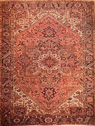 A close up of a rug with a pattern on it.