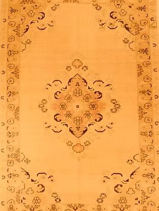 A close up of a rug with a pattern on it