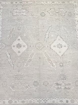 A close up of a rug with a pattern on it.