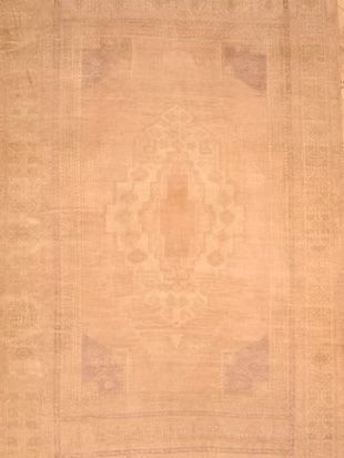 A close up of a rug with a pattern on it.