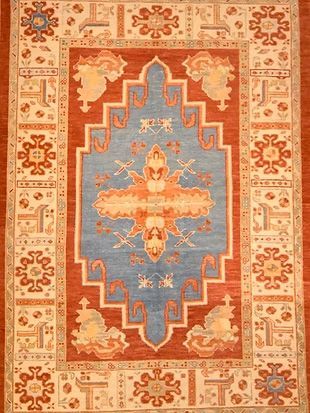 A rug with a blue and orange pattern on it