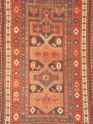 A rug that has a geometric pattern on it