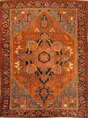 A close up of a rug with a pattern on it.