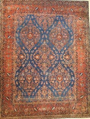 A rug with a blue pattern on it is sitting on a table.