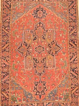 A close up of a rug with a pattern on it.