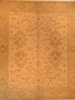 A close up of a rug with a floral pattern on it.