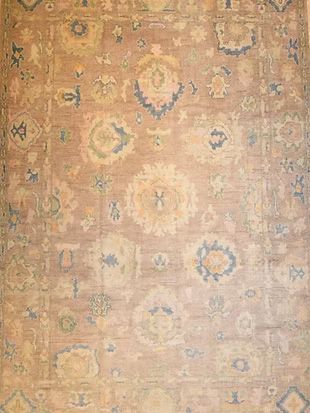 A close up of a rug with a pattern on it.