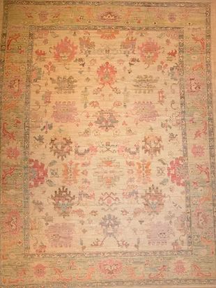 A rug with a floral pattern on it is sitting on a table.