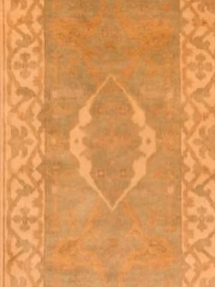 A close up of a rug with a pattern on it