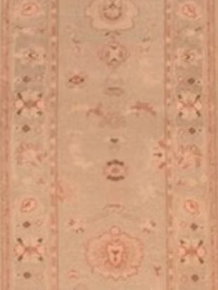 A close up of a rug with a floral pattern on it.
