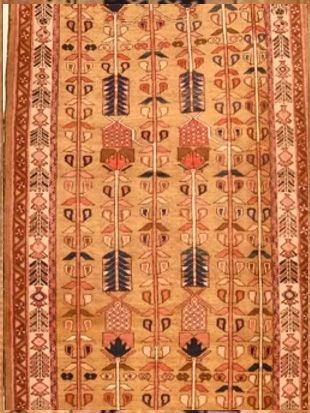 A rug with a pattern of arrows and flowers on it