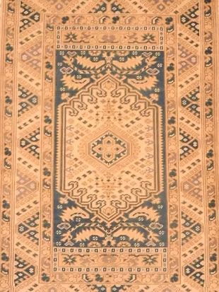 A rug with a floral pattern on it