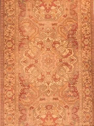 A close up of a rug with a pattern on it.