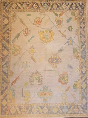 A rug with a geometric pattern on it is sitting on a table.