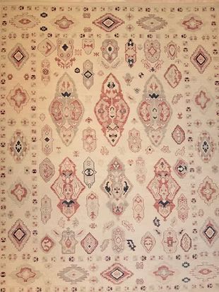 A close up of a rug with a pattern on it.