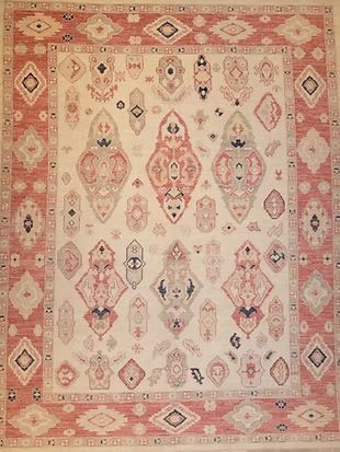 A rug with a pink and white pattern on it