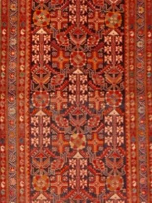 A close up of a rug with a pattern on it