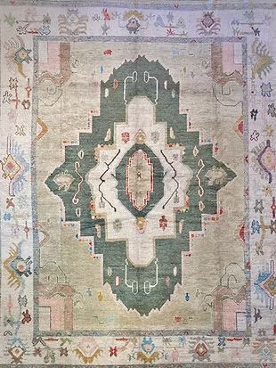 A close up of a rug with a geometric pattern on it.