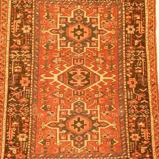 A close up of a rug with a pattern on it.