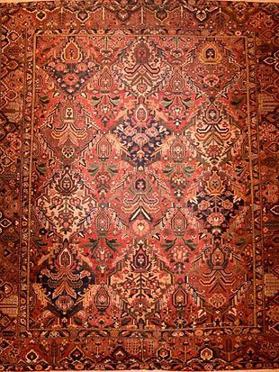 A close up of a rug with a pattern on it.