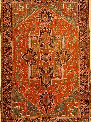 A close up of a rug with a pattern on it.