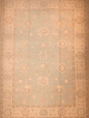 A rug with a floral pattern on it is sitting on a table.