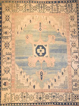 A rug with a blue and white pattern on it