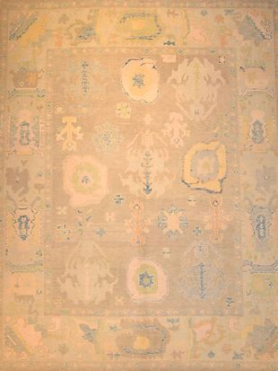 A close up of a rug with a floral pattern on it.