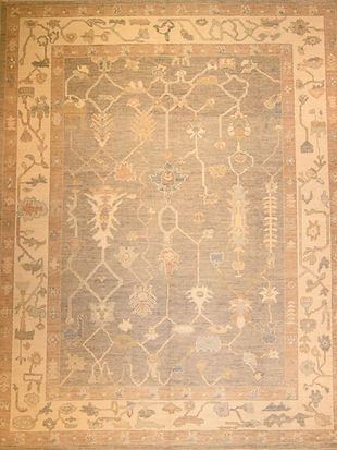 A rug with a floral pattern on it is sitting on a table.