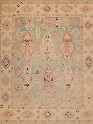 A close up of a rug with a geometric pattern on it.
