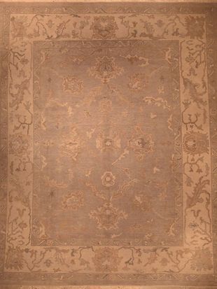A close up of a rug with a floral pattern on it.