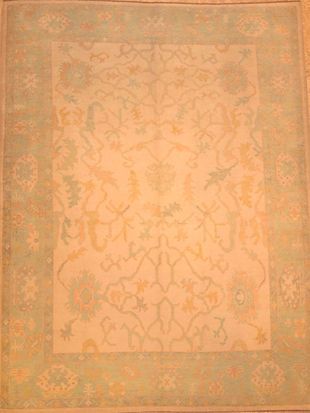 A rug with a floral pattern on it is sitting on a table.