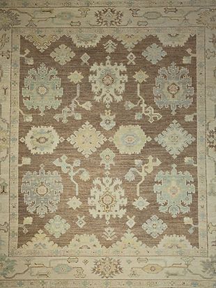 A close up of a rug with a pattern on it.