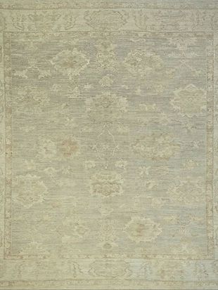 A close up of a rug with a floral pattern on it.