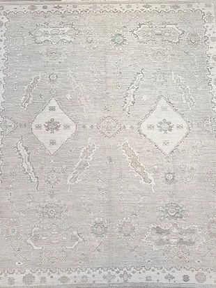 A close up of a rug with a pattern on it.