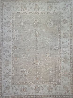 A close up of a rug with a floral pattern on it.