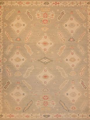A close up of a rug with a pattern on it.