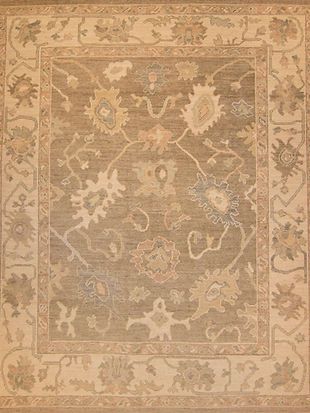 A close up of a rug with a floral pattern on it.