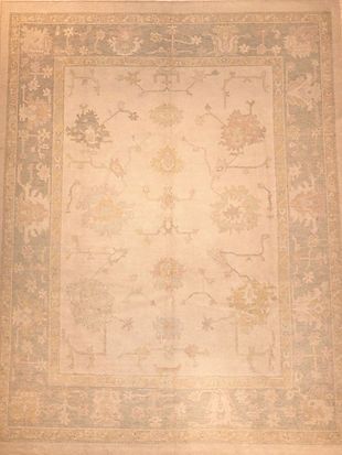 A rug with a floral pattern on it is sitting on a table.